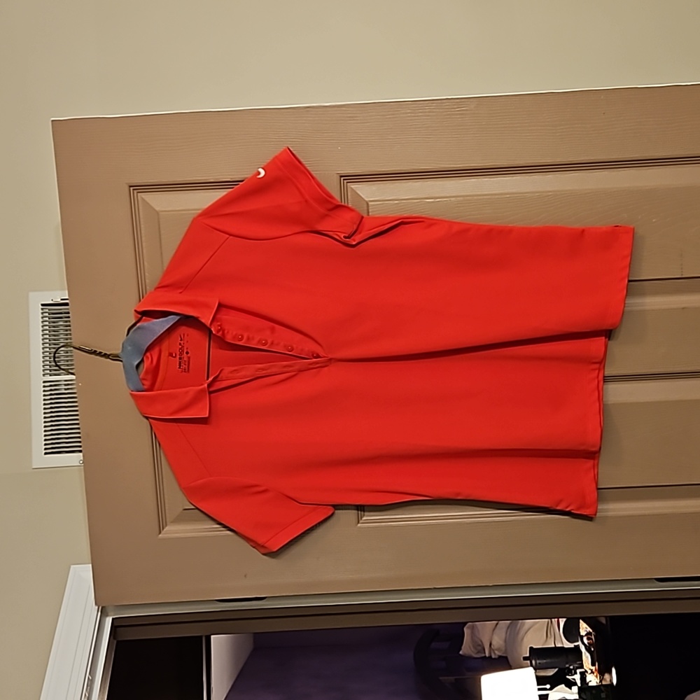 Raspberry  ish. Golf shirt